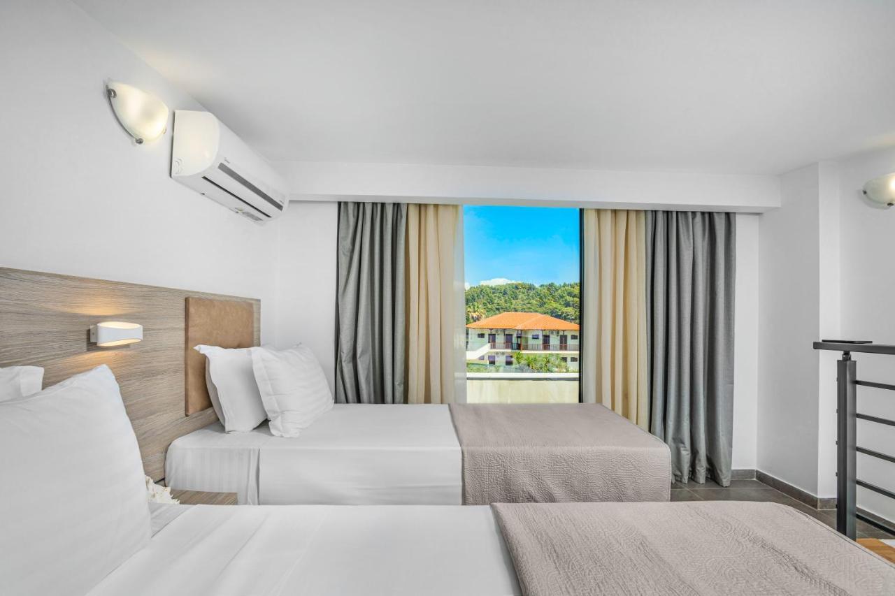 Newstory Suites Посиди Екстериор снимка