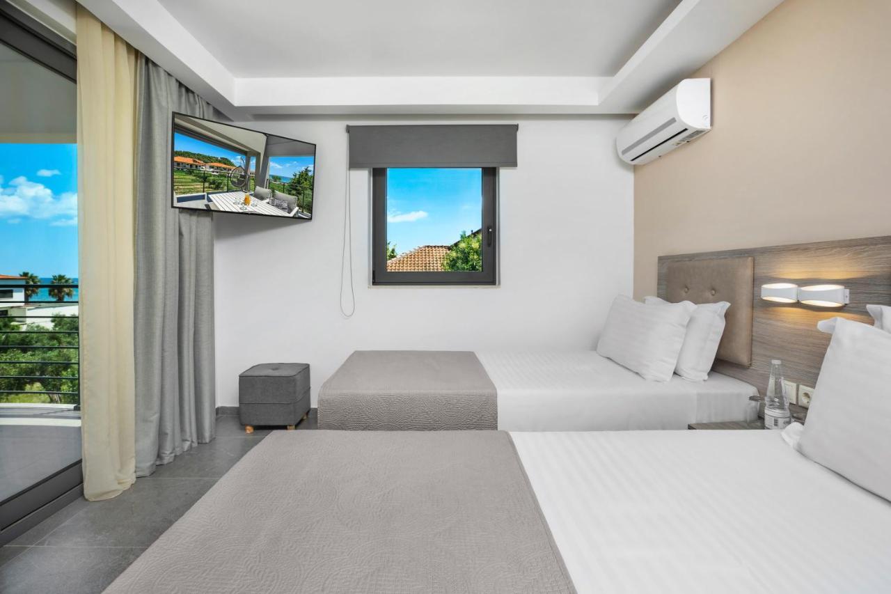 Newstory Suites Посиди Екстериор снимка