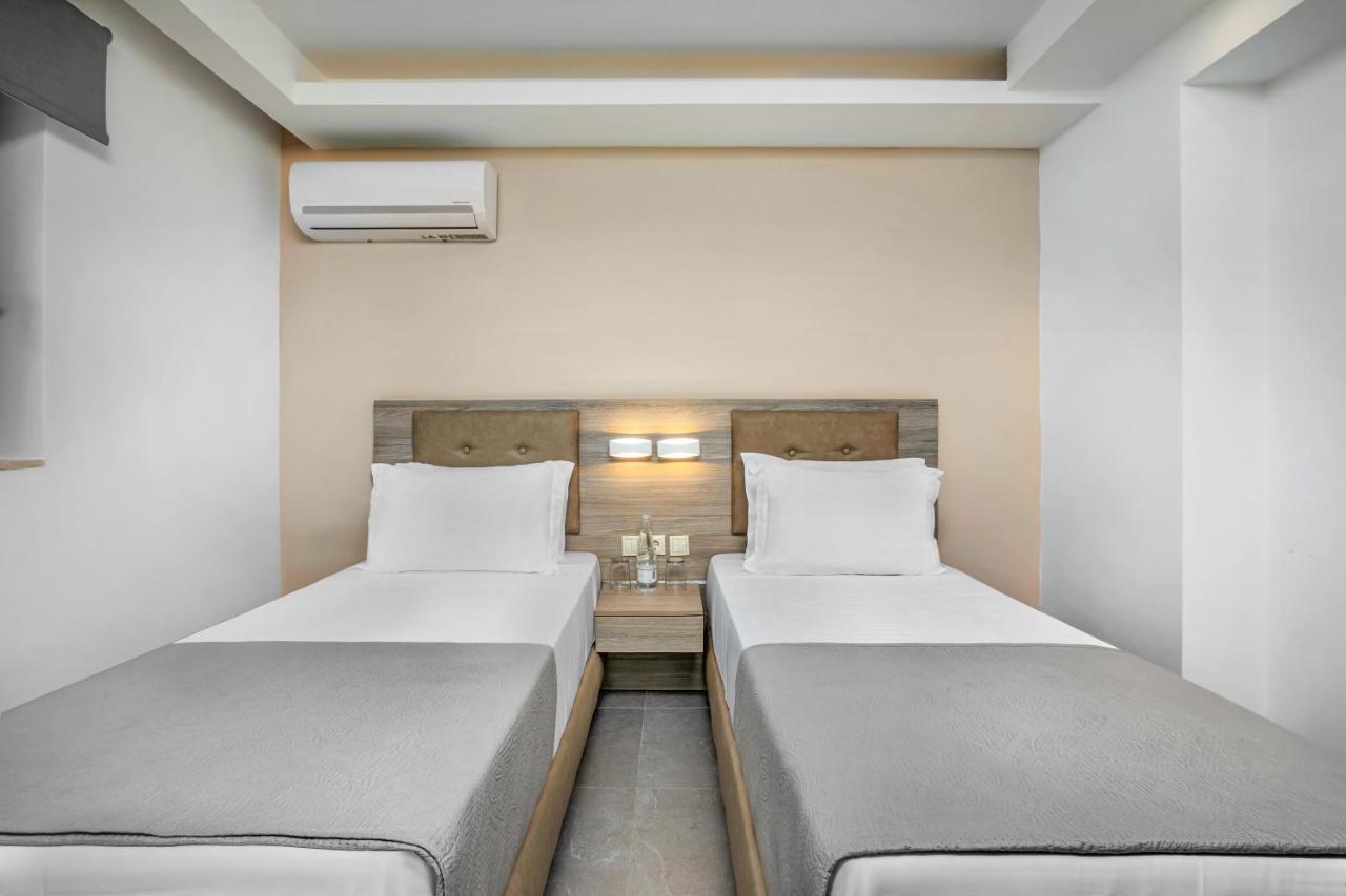Newstory Suites Посиди Екстериор снимка