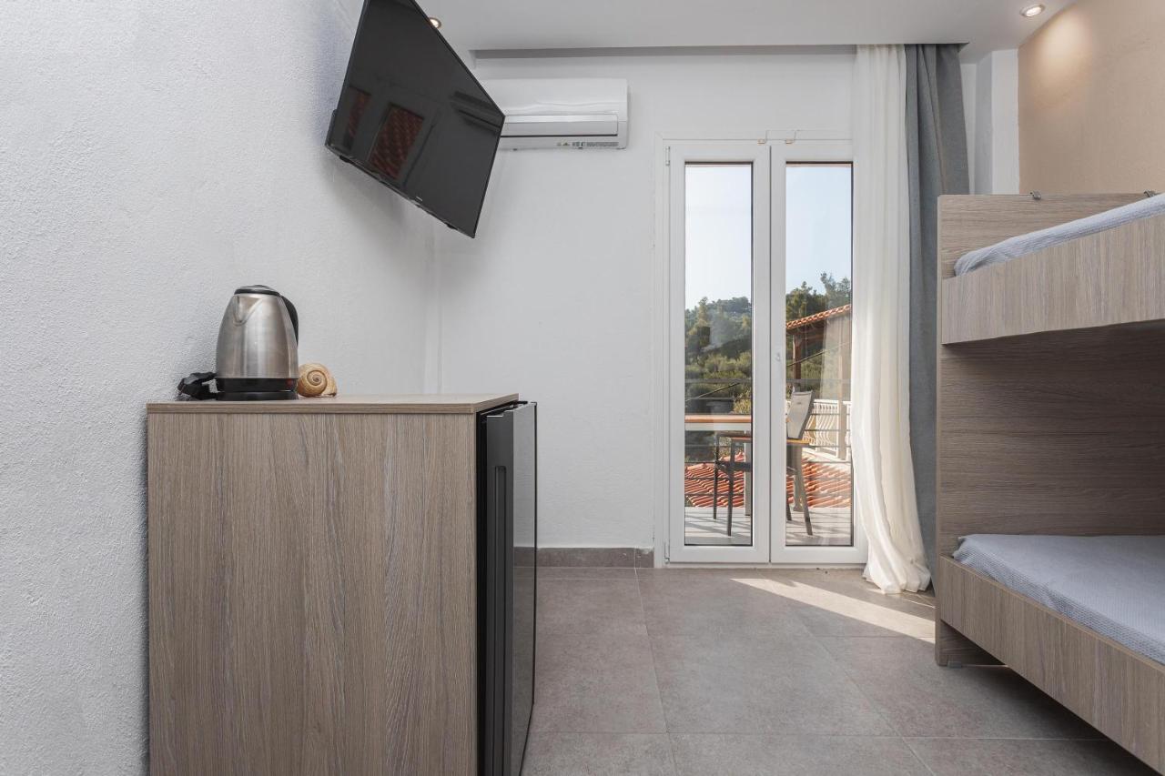 Newstory Suites Посиди Екстериор снимка