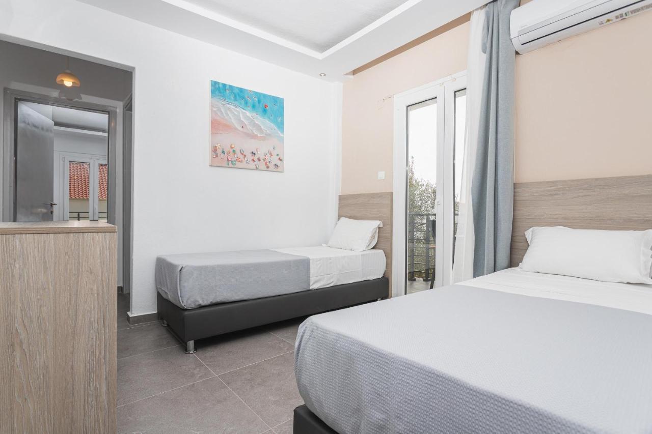 Newstory Suites Посиди Екстериор снимка