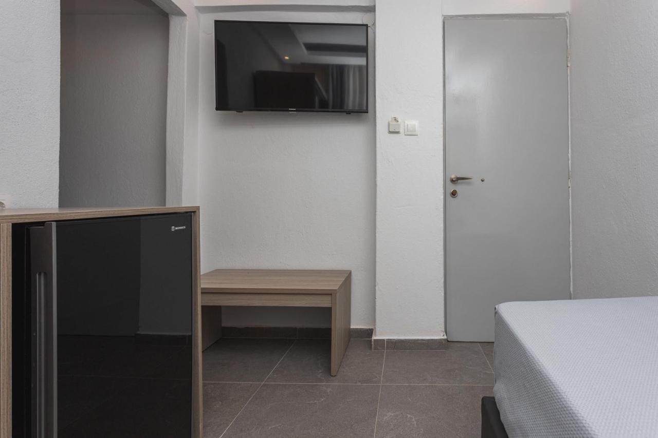 Newstory Suites Посиди Екстериор снимка