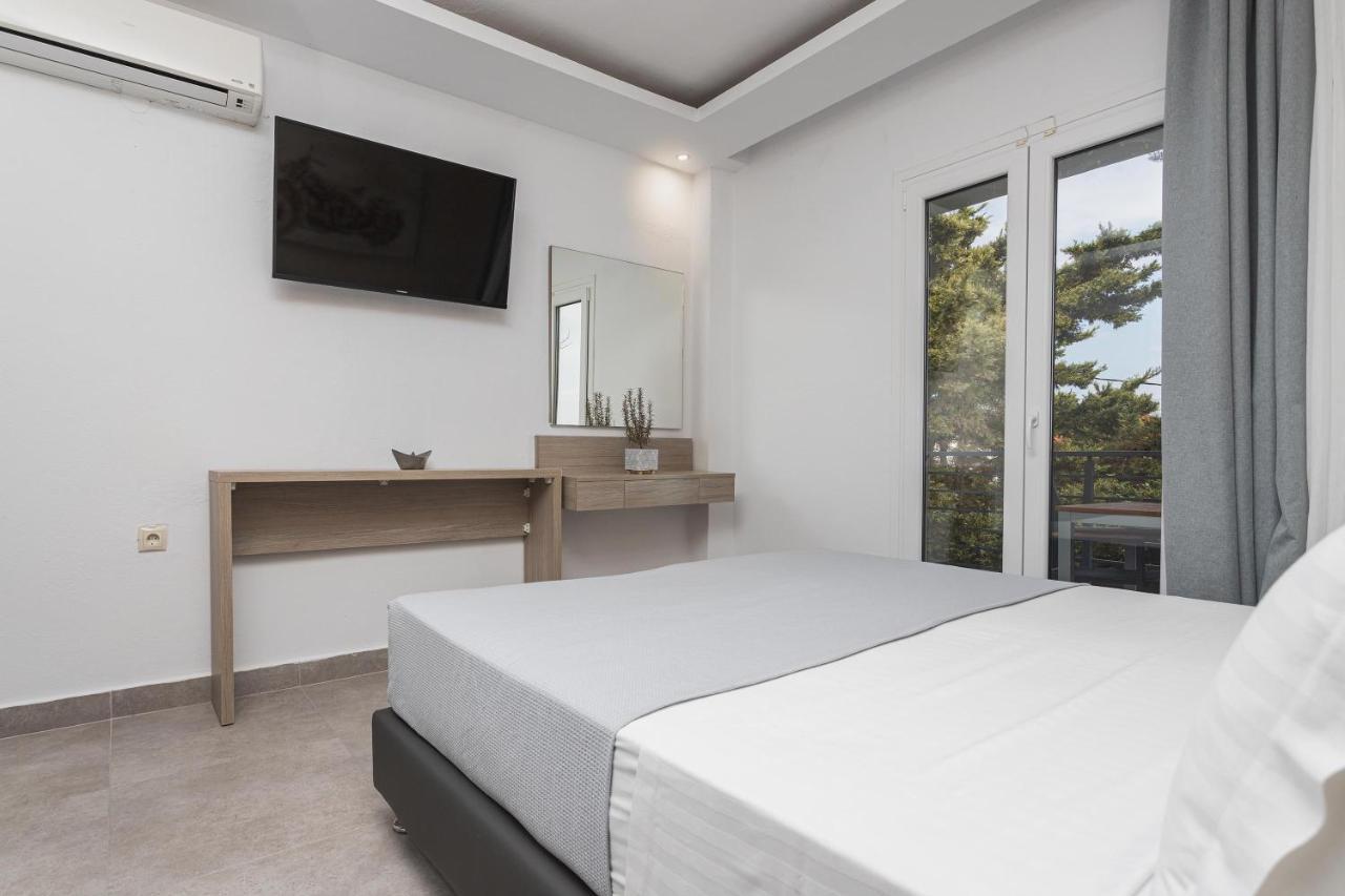Newstory Suites Посиди Екстериор снимка